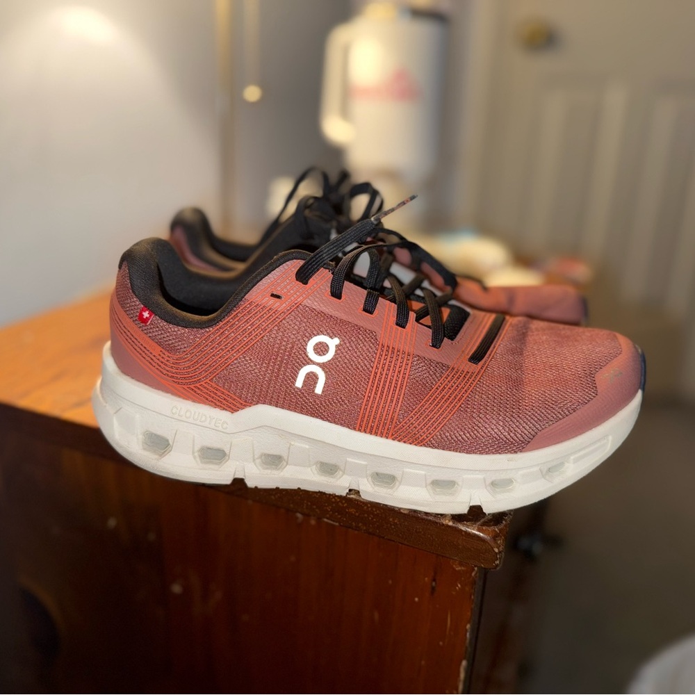 On Running CloudGo Sneakers in Orange and Black